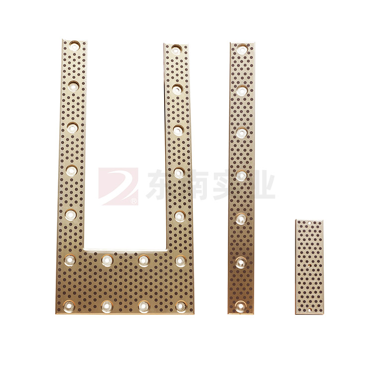 Self-lubricating wear-resistant plate